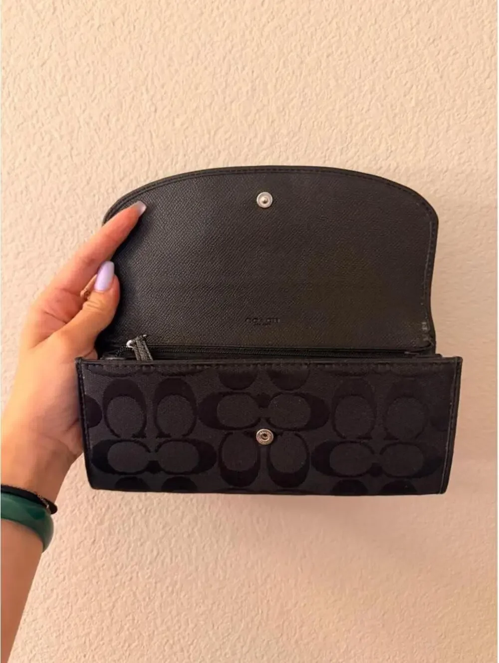 Black Coach Wallet with Silver Emblem